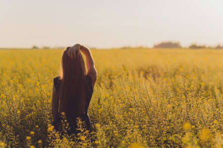Beauty Girl Outdoors enjoying nature. Beautiful Teenage.