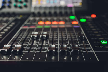 Part of an audio sound mixer with buttons.の写真素材