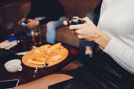 Controller or Videogame Joystick Console in hands. Close up, game concept.の写真素材