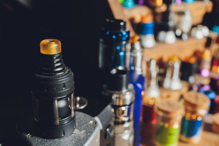 Popular vaping device mod.Upgrade parts for modern vaporizer e-cig device,spare parts.New device model,micro coil clearomizer.Quit smoking nicotine cigarette,start vaping safe ecig vape.の写真素材