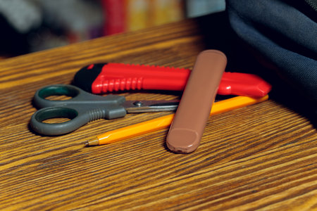 POD e-cigarette or nicotine vapor stick a by school bag.の写真素材