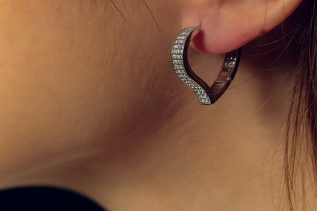 close up of boho styled woman hands with silver jewelry.の写真素材