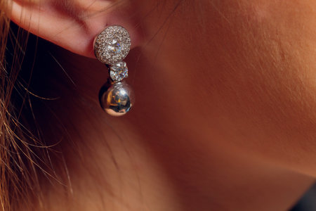close up of boho styled woman hands with silver jewelry.の写真素材