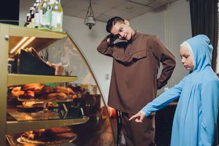 beautiful muslim caucasian russian man wearing dress relaxing.