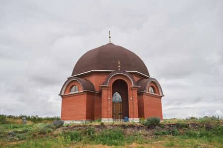 Mosque under construction against the blue sky, finishing work of minarets.の写真素材