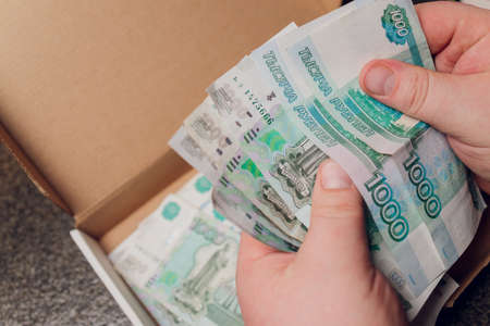 Russian rubles in the hands of a business woman.の写真素材