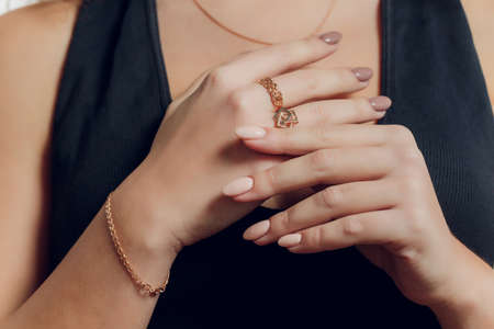 close up of boho styled woman hands with silver jewelry.の写真素材