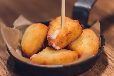 Bowl of arancini - rice balls with mozzarella.の写真素材