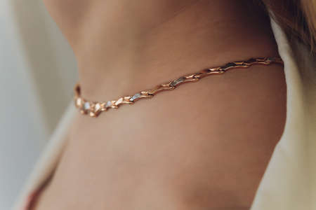 Close up Detail of a Beautiful Necklace in Glamour Shot - Image of a beautiful precious piece around model s neck.の写真素材