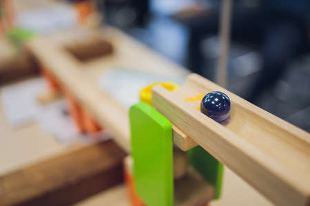 Multi-colored blocks of a wooden constructor. Concept of development of preschool children. Close.の写真素材