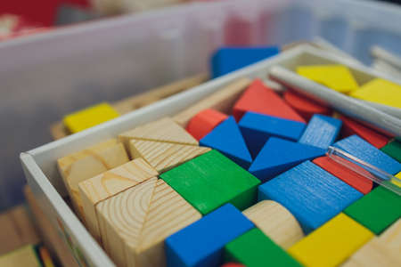 Multi-colored blocks of a wooden constructor. Concept of development of preschool children. Close.の写真素材