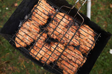 Top view meat steak cooking on grill background.の写真素材