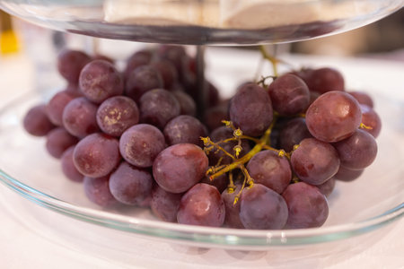 Dinner table with snacks decorated with beautiful summer flowers. Food Table Healthy Delicious Organic Meal Concept. Waiting for the guest.の写真素材
