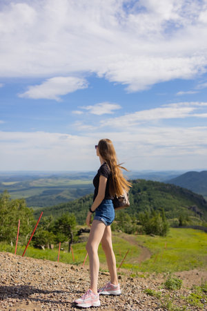 Young beautiful woman posing for a photo with amazing Spajici lake in the background.の写真素材
