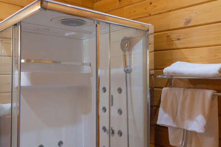 angular shower enclosure with transparent doors.の写真素材