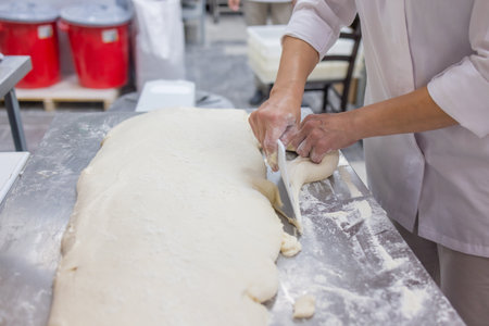Close up of woman Kneading Pizza Dough.
