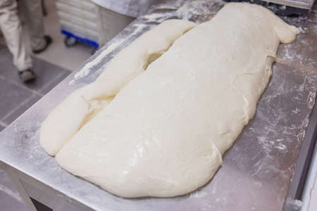 Close up of woman Kneading Pizza Dough.