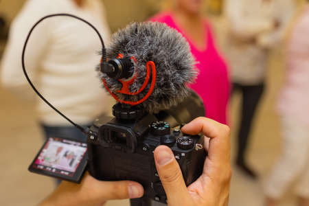 Production movie video concept : Professional videographer or photographer holding setting...