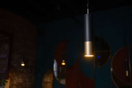 Chandelier background - Luxury crystal chandelier hanging from the ceiling indoors.