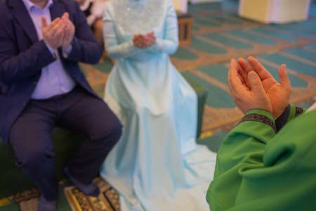 National wedding. Bride and groom. Wedding muslim couple during the marriage ceremony. Muslim marriage.の写真素材