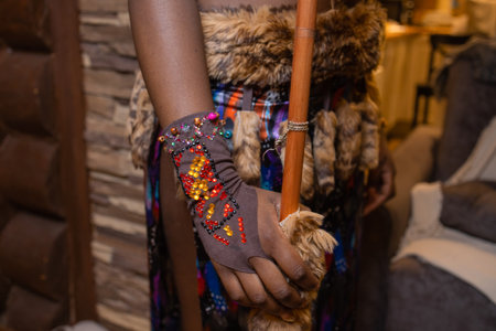 Indigenous Malaysian aboriginal craftwoman making a spear for hunting.