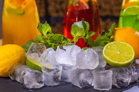 fruit and berry lemonades on the wooden tray with spruce.の写真素材
