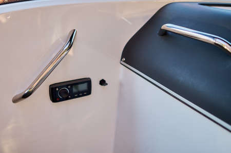 Image of the interior of a small transport motorboat.