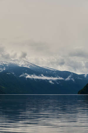 Beautiful panoramic view at Kucherla mountain lake and mountain range. Belukha national park, Altai...