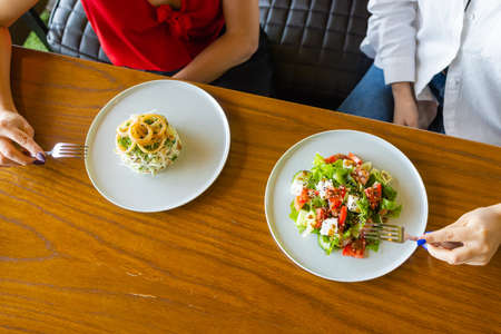 table with many salad top view. Different salads on concrete table, top view. Vegetable salad, Salad...
