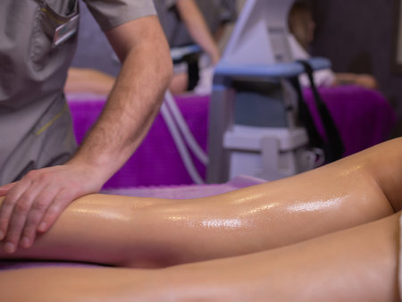 relaxing pain. fabulous full foot massage.close up side view cropped photo.の写真素材