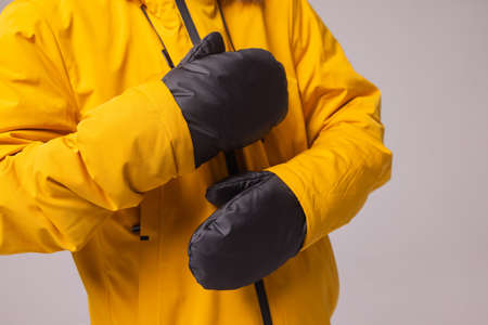 Winter knitted woolen gloves on isolated white background.の写真素材
