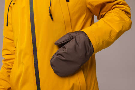 Winter knitted woolen gloves on isolated white background.の写真素材