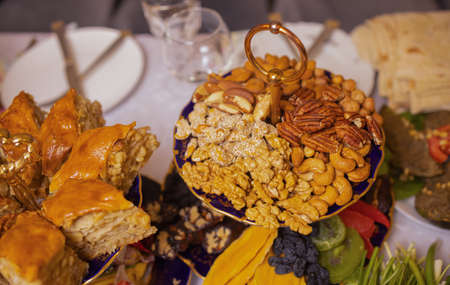 Variety of 12 assorted nuts and dried fruits.の写真素材