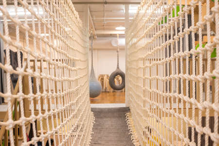 Sport rope against toys background.Interior of childrens room.の写真素材