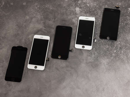 Broken mobile phone screen, black, white, clipping path. Smartphone monitor damage mock up. Cellphone crash and scratch. Telephone display glass hit. Device destroy problem. Smash gadget, need repair.の写真素材