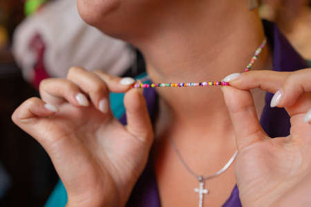 Detail shot of elegant golden chocker made as multicolor sparkling rhinestone rows with buckle. The elegant necklace.の写真素材