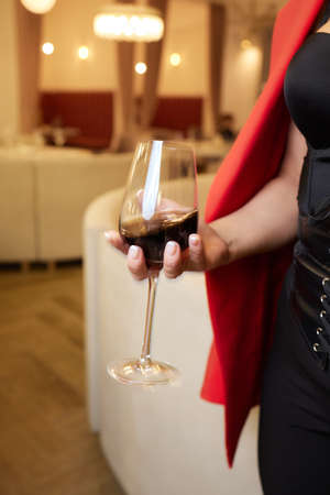 close-up of gorgeous woman with a glass of champagne. party and holiday celebration.