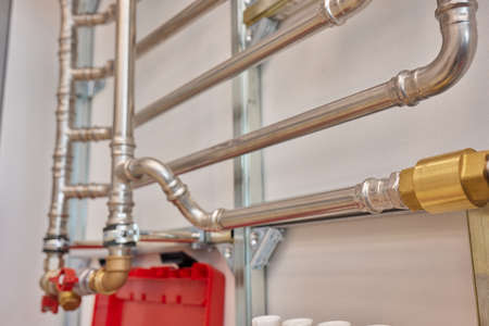 Plumbing service. copper pipeline of a heating system in boiler room.
