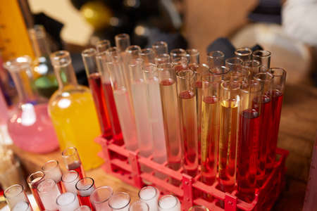 Laboratory glassware with alcohol cocktails on chemical party.