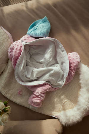 This Front View Premium Baby Fleece Mockup In Peach Melba Color, is printable and can easily be...