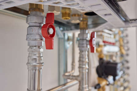 Plumbing service. copper pipeline of a heating system in boiler room.