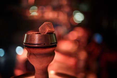 shisha hookah red hot coals. Sparks from breathe.