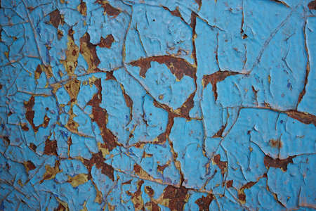Texture of rusty iron with blue background. The metal surface rusted spots.old metal iron rust...