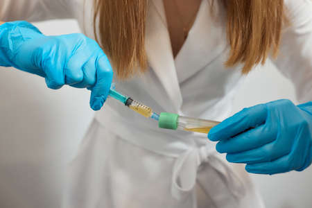 Platelet-Rich plasma preparation. Plasma in syringe. Centrifuge.の写真素材