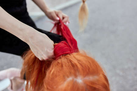 weave braid girl in a hair salon.の写真素材