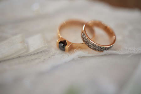 Wedding day, two rings on the small decorative pillow.の写真素材