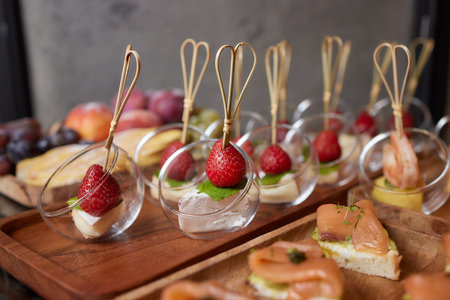 Gourmet appetizers: caviar, venison, tuna and salmon.