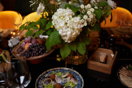 Salad and chopsticks on the table with many fruits, legumes and vegetables. Balanced feeding...
