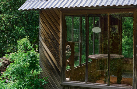 Countryside old rural house in the middle of the forest, like russian childrens fairy tales. selective focus.の写真素材