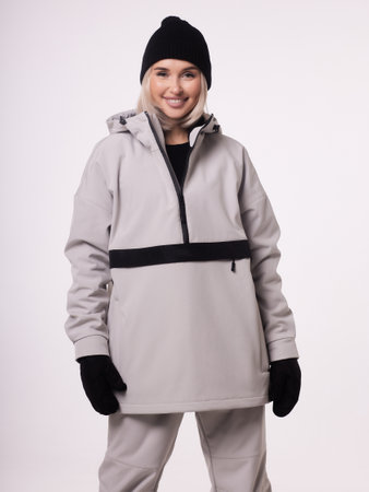 Skier happy caucasian satisfied smiling woman 20s wear warm padded windbreaker jacket ski.
